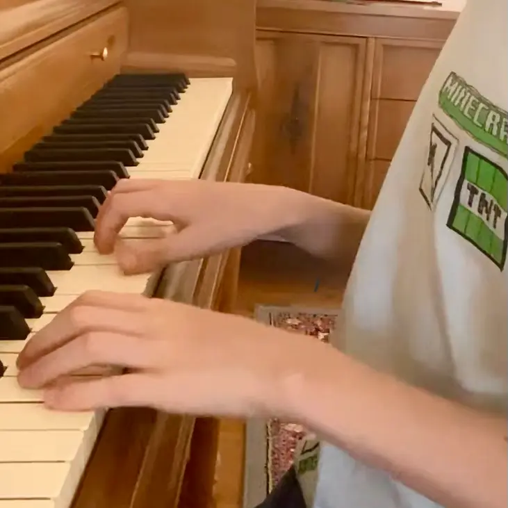 Piano lesson in progress