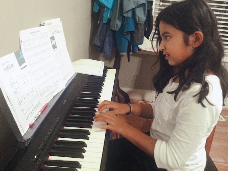 Piano lesson in progress