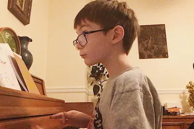 Piano lesson in progress