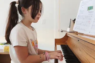 Piano lesson in progress