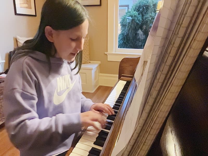 Piano lesson in progress